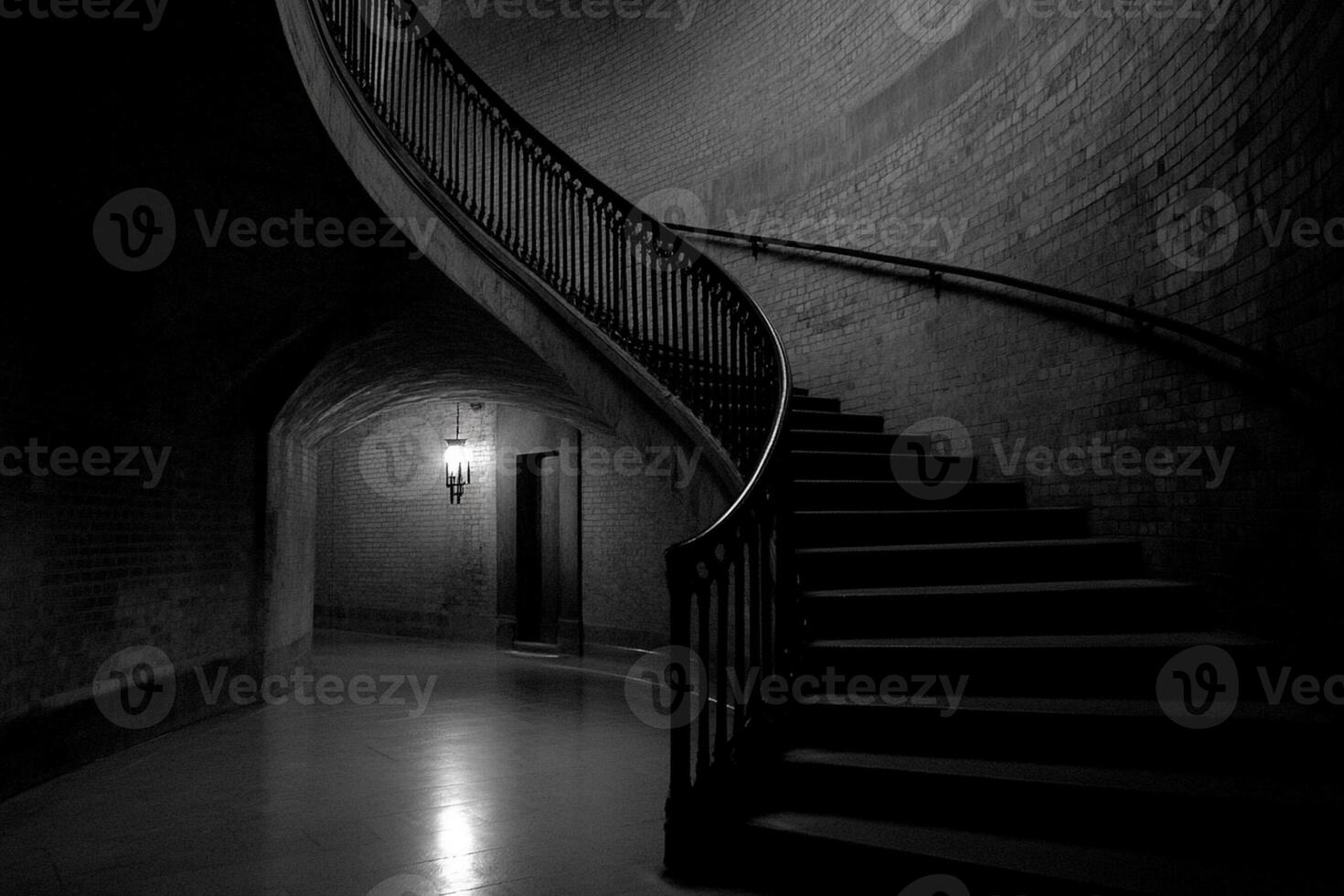 A black and white photo of a dark stairway