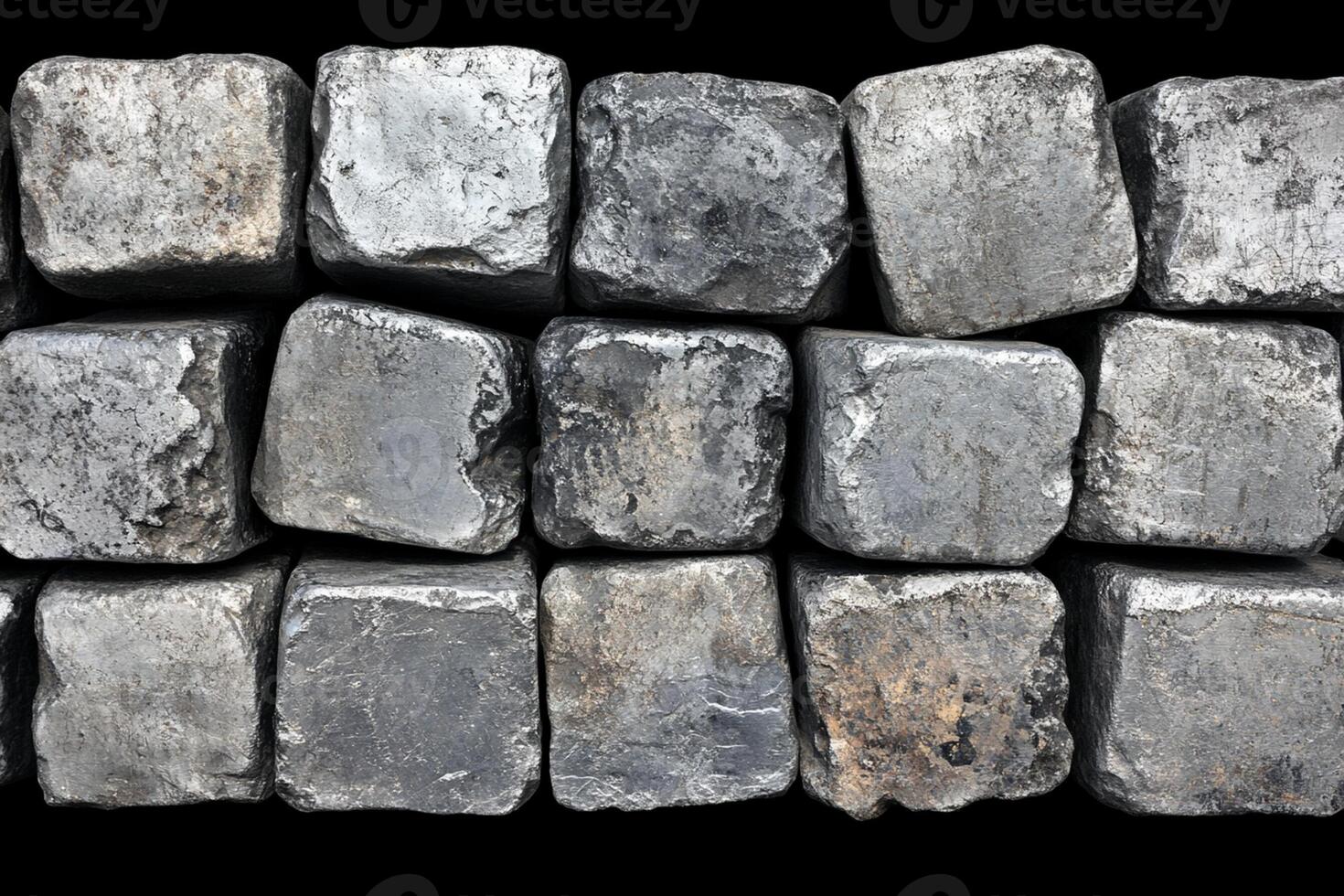 A pile of silver bars on a black background photo