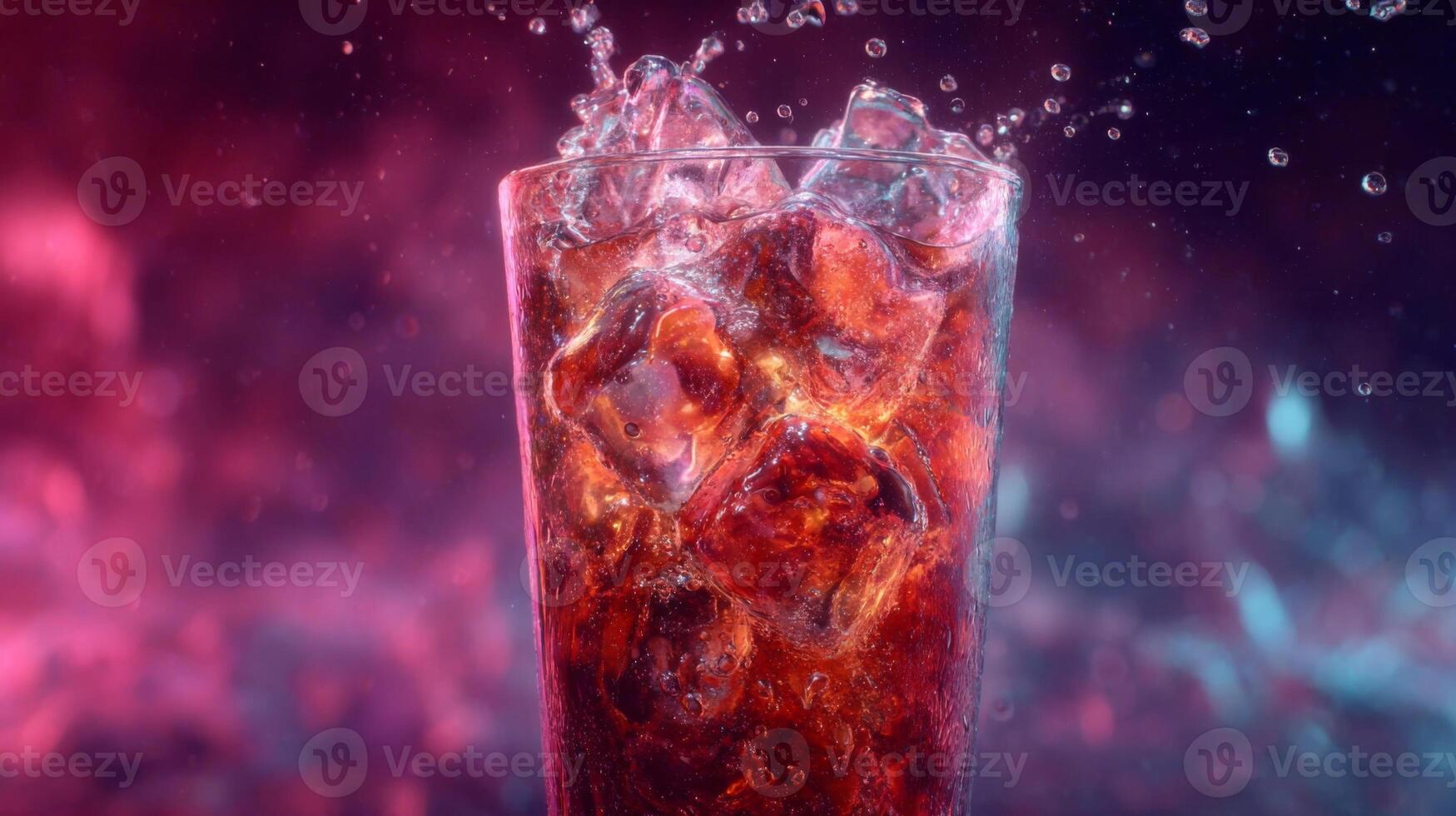 Refreshing glass of soda with ice cubes and colorful background creating a vibrant drink scene photo