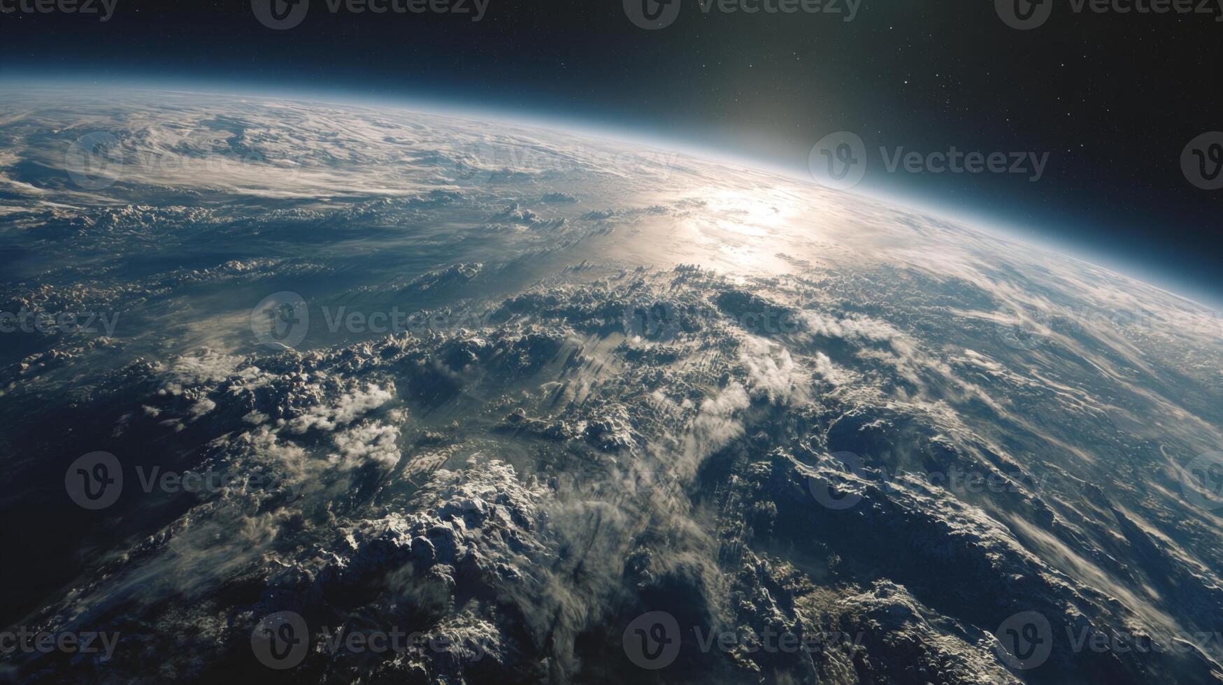 Stunning View of Earth from Space with Atmospheric Clouds and Mountainous Terrain Illuminated by Sunlight photo