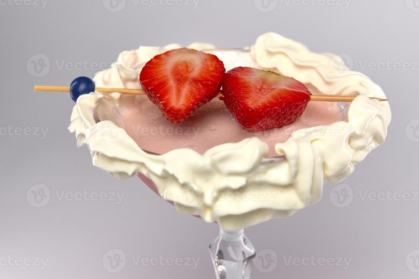 Delightful Dessert Martini with Fresh Strawberries and Whipped Cream, Perfectly Garnished for an Irresistible Sweet Treat Experience photo