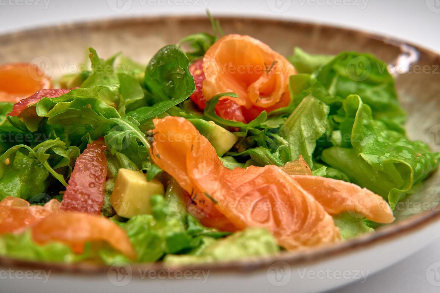 Fresh Green Salad with Smoked Salmon and Colorful Vegetables Creating a Delightful Culinary Experience of Flavor and Texture photo