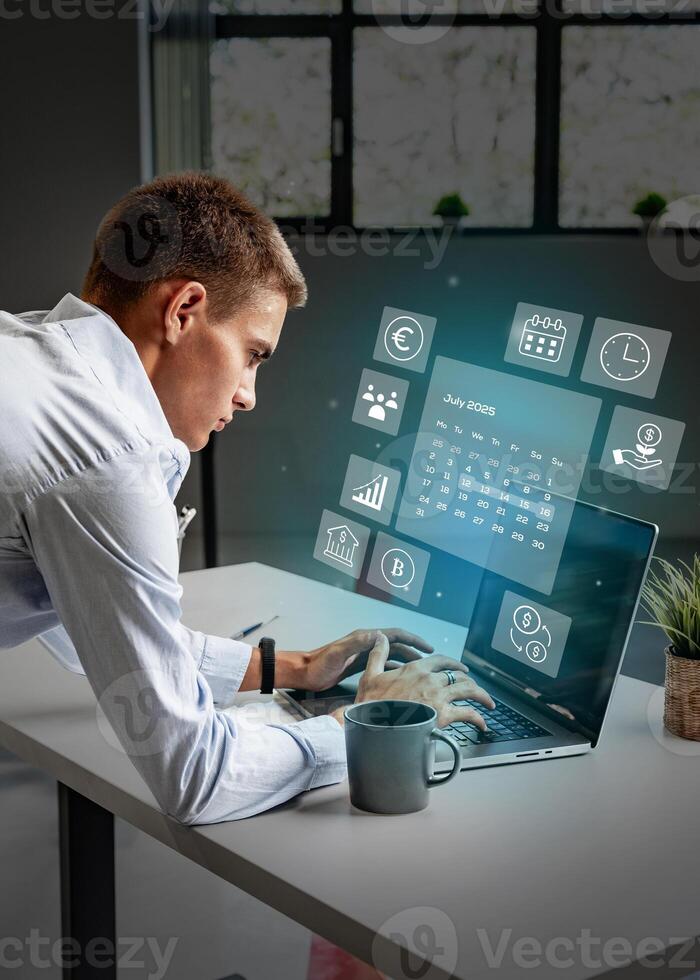 Business professional using laptop in modern office with digital interface displaying productivity tools in the afternoon photo
