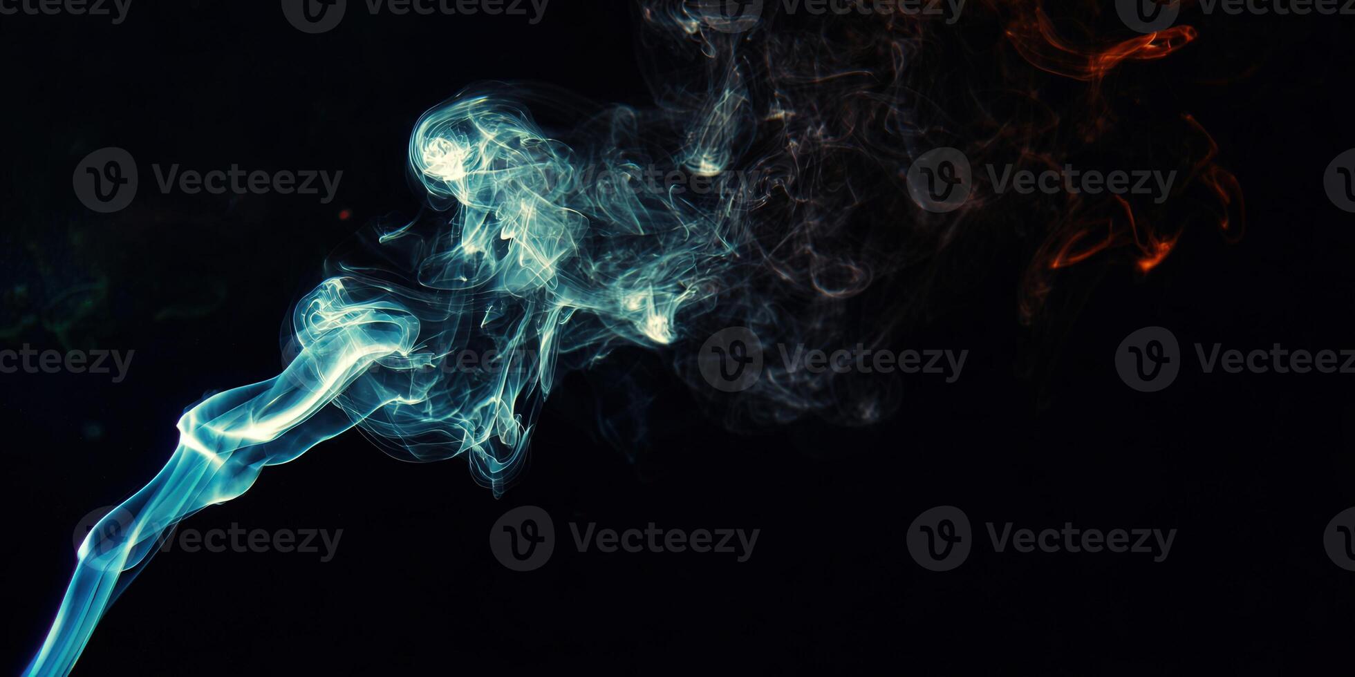 Vibrant teal and orange smoke elegantly swirls on a dark background, creating an artistic and dynamic composition. photo