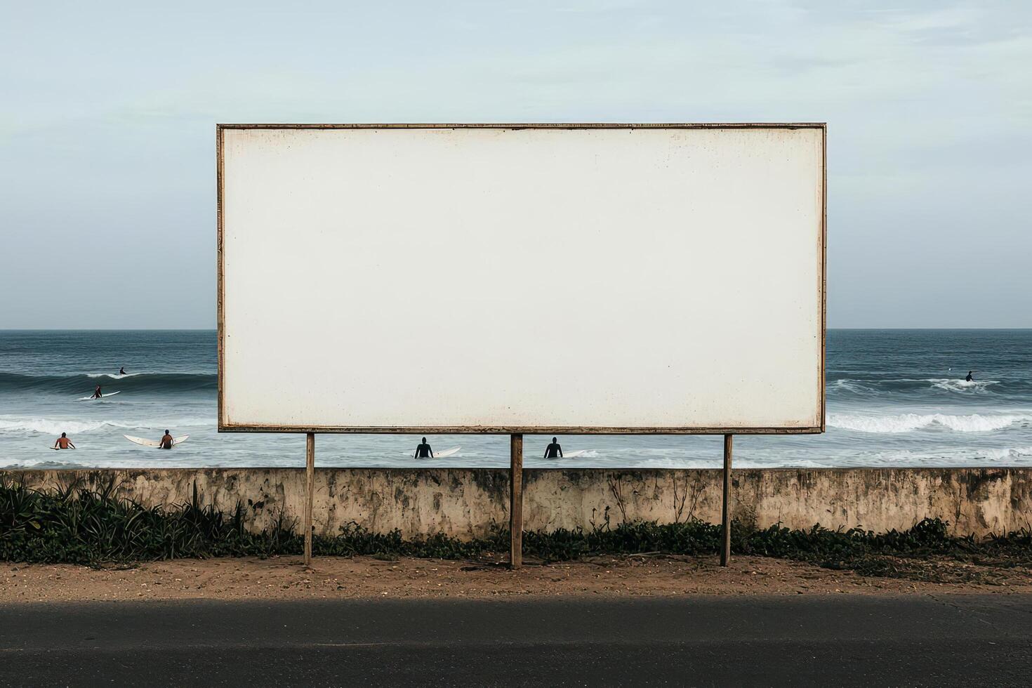 Empty billboard facing the ocean, minimalistic coastal view, no text. photo
