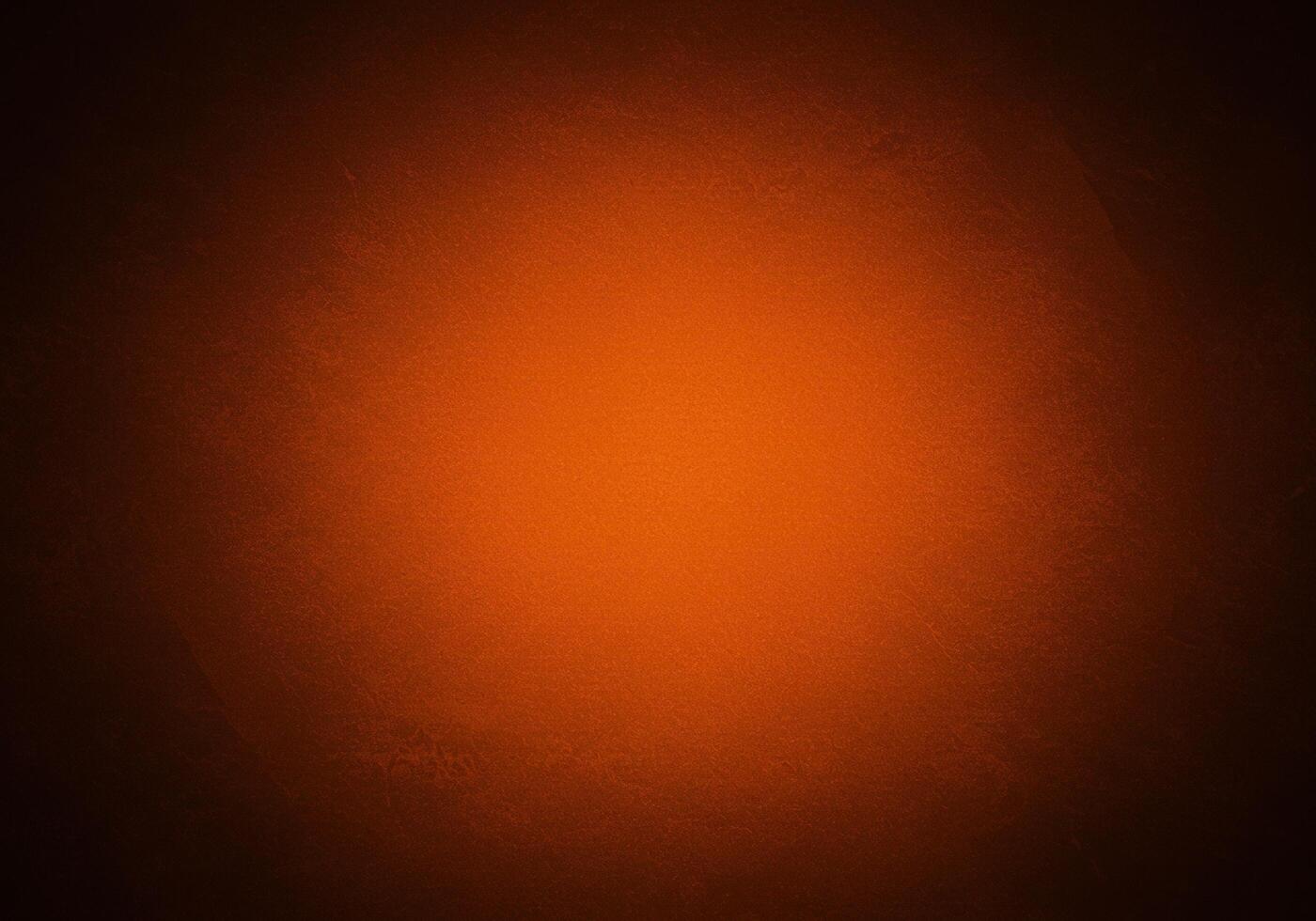 A warm orange background with a subtle texture and a gradient effect photo