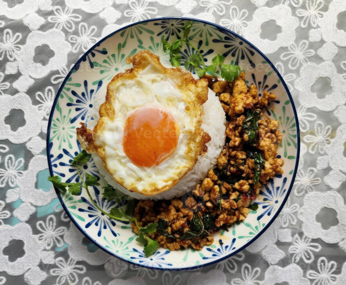 Authentic Thai Basil Pork with Fried Egg, Pad Krapao Moo Sub Kai Dao photo
