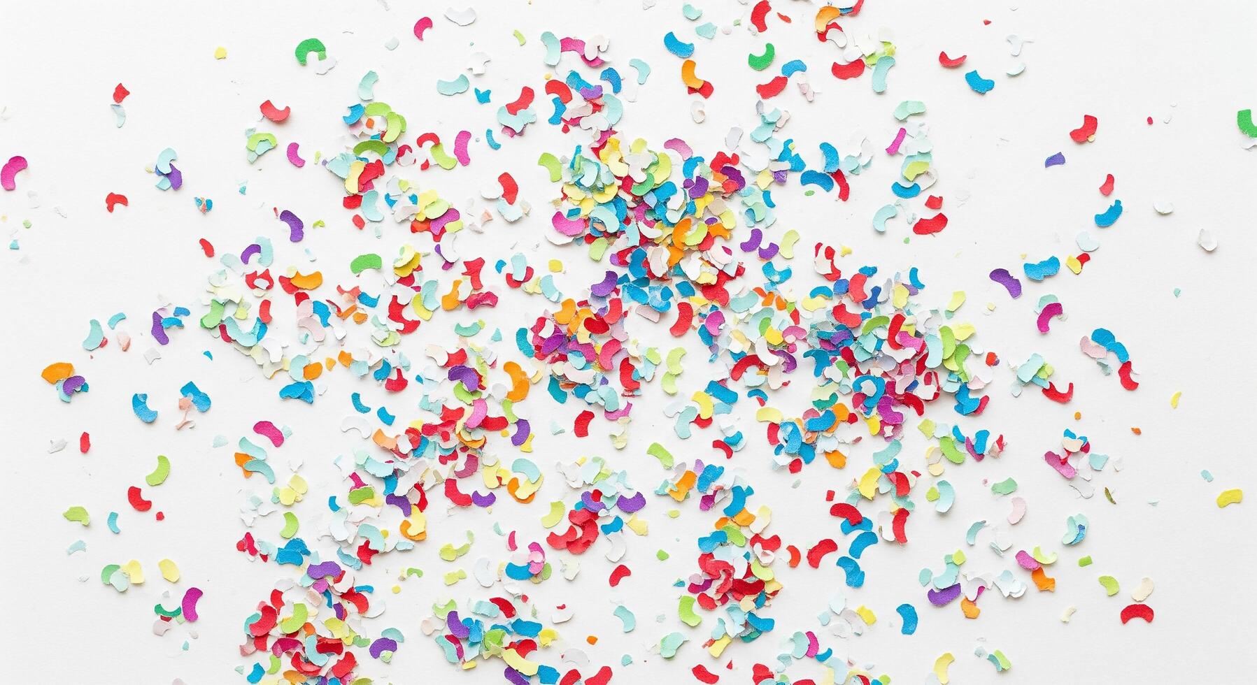Festive Confetti Paper Texture Background with Randomly Dispersed Multicolored Paper Fragments on Soft White Base photo
