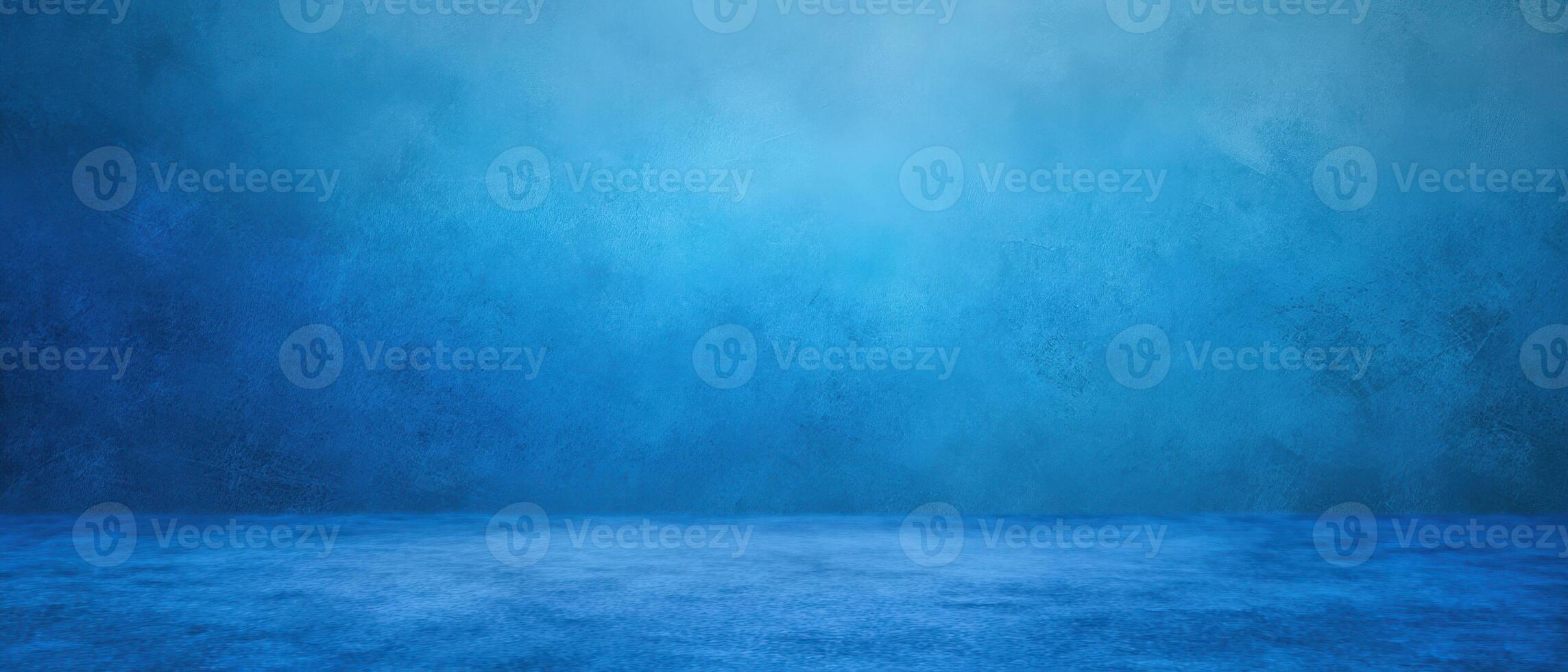The serene blue background creating a calming and artistic atmosphere for creativity. photo