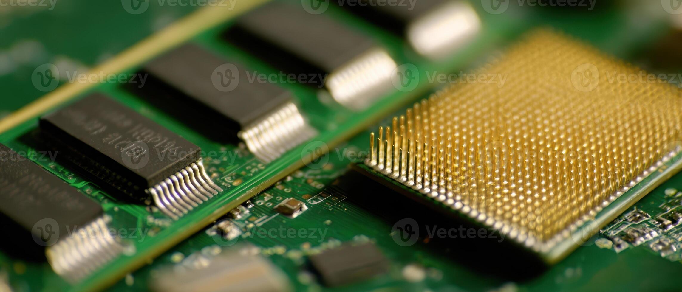 The close-up view of a microchip on a green circuit board. photo