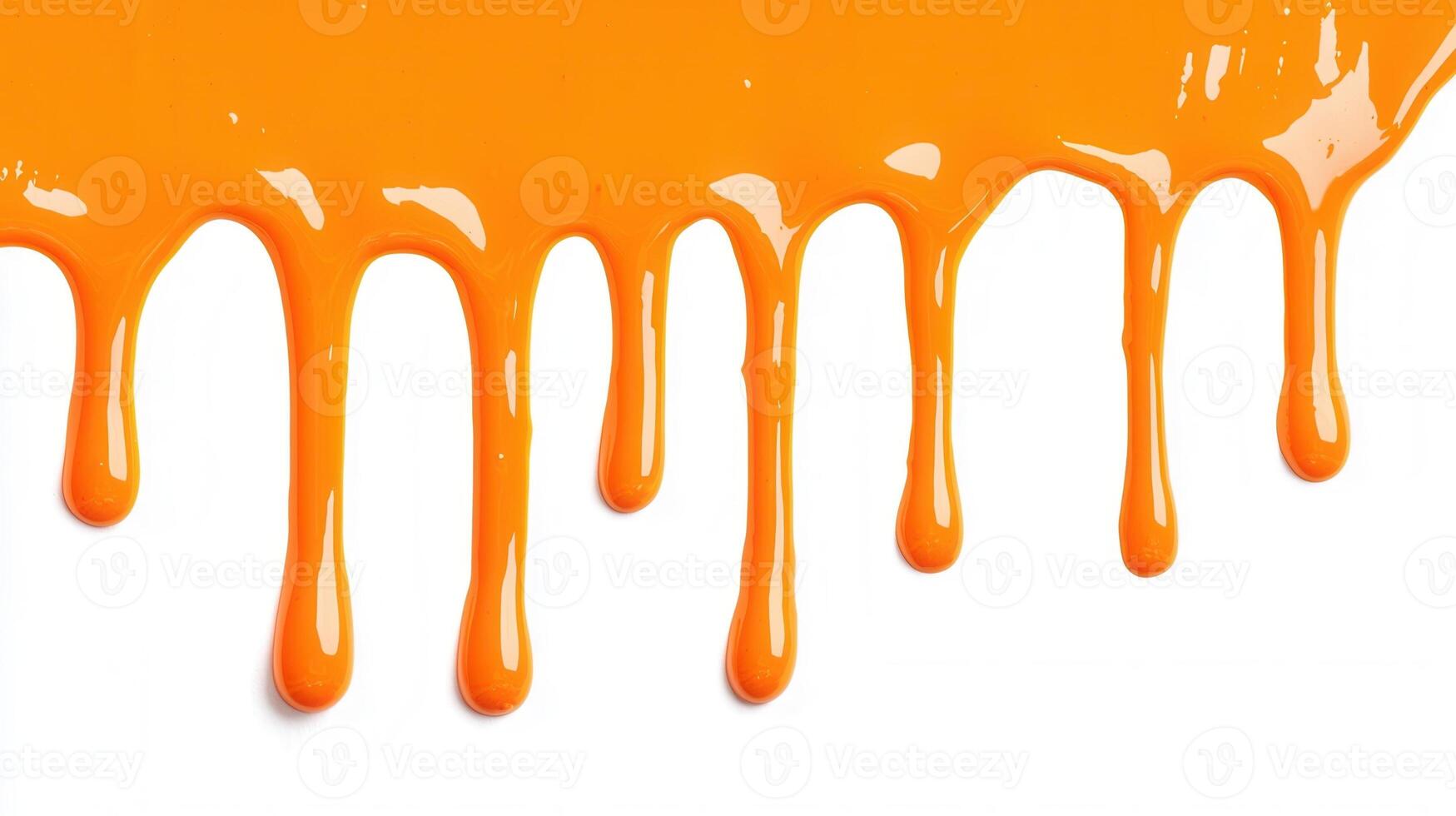 Thick orange paint dripping down a white wall, creating an abstract pattern of flowing lines and drops photo