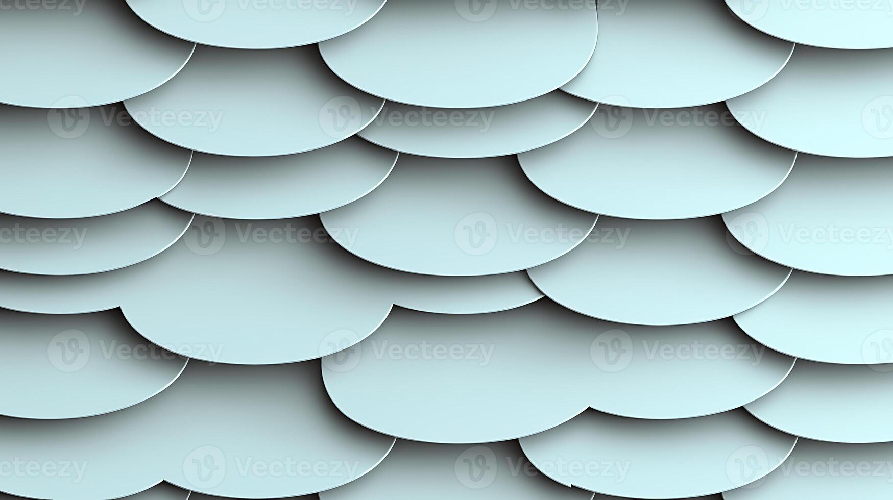 Abstract pattern of overlapping scalloped shapes in soft blue tones, creating a textured background photo