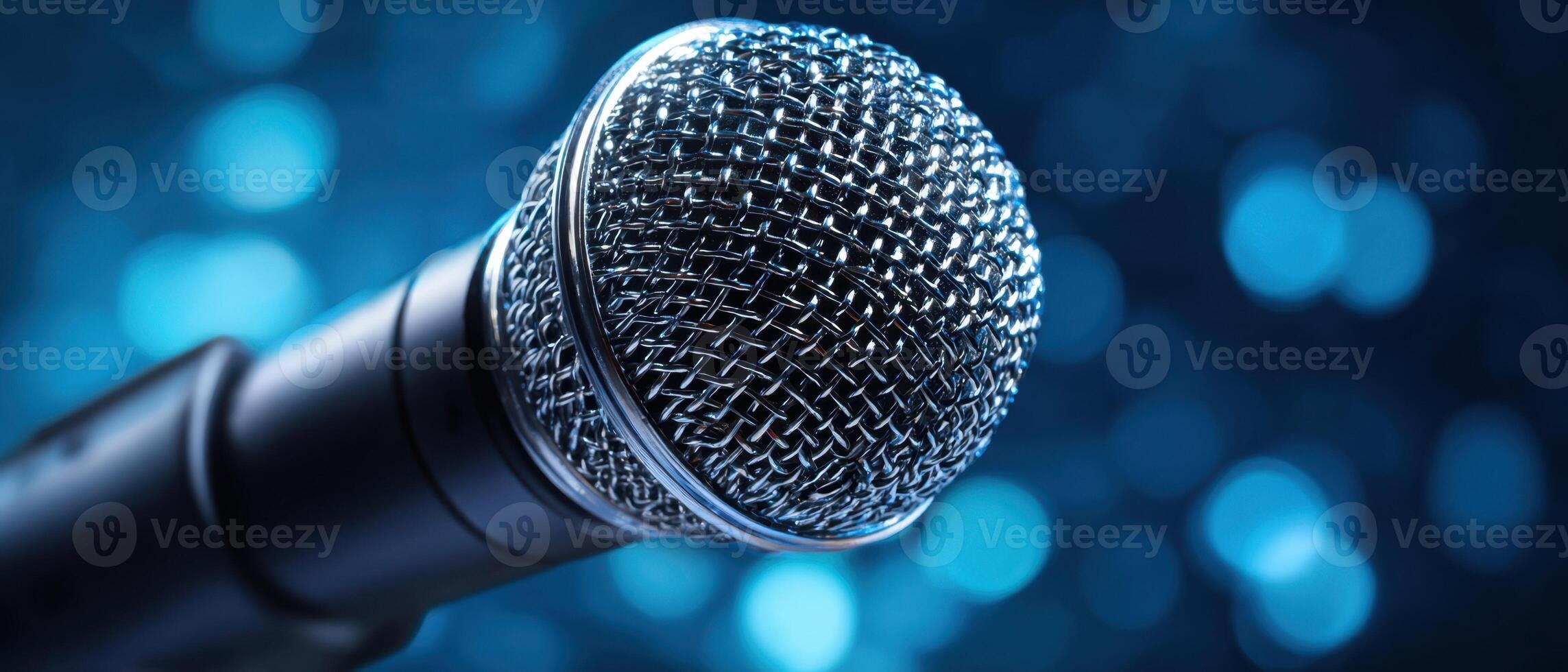 The close-up view of a professional microphone with a vibrant bokeh background. photo