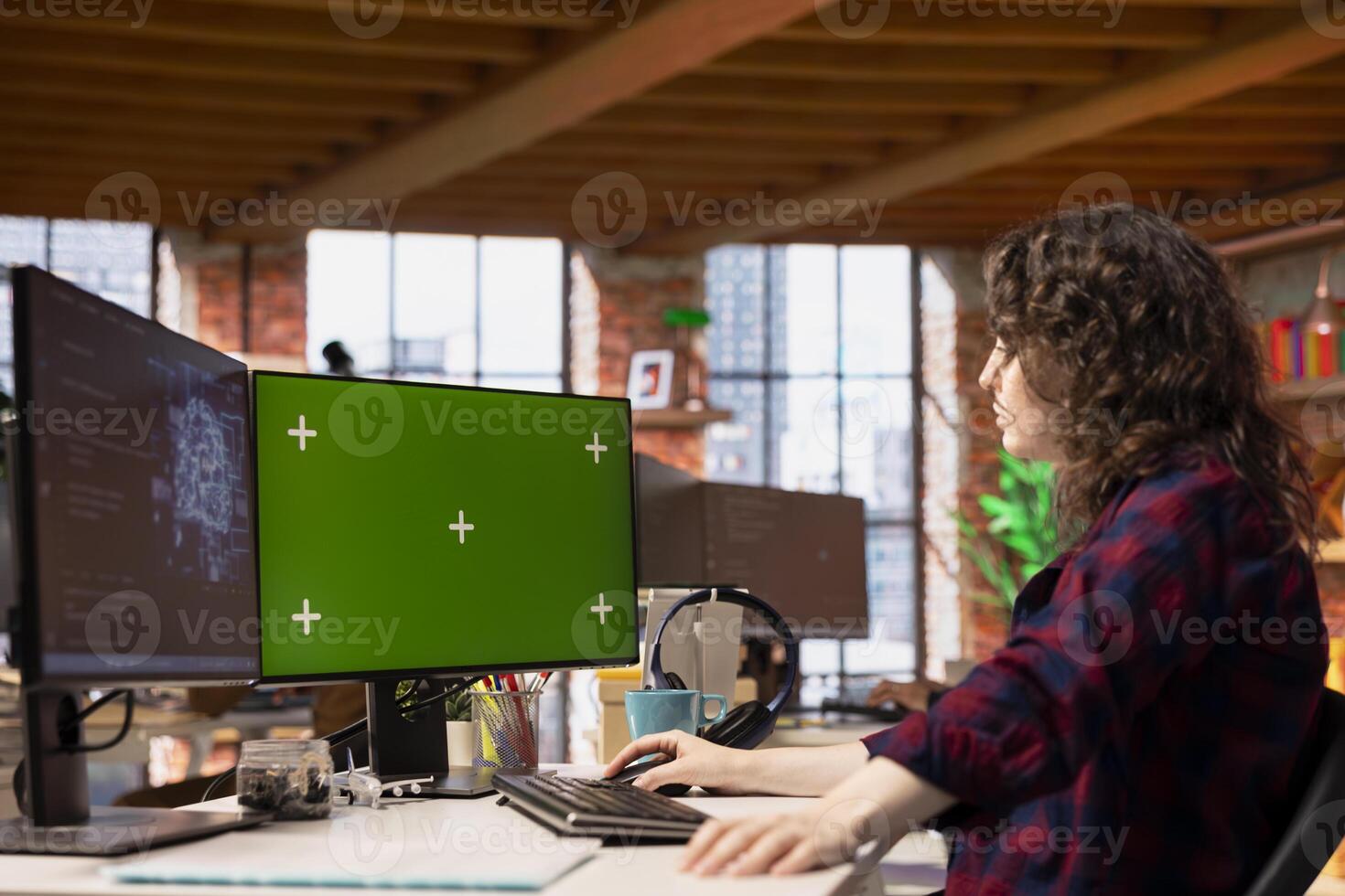 Startup admin using green screen PC, coding AI algorithm and machine learning models enhancing automation. IT specialist using chroma key computer in artificial intelligence Silicon Valley workplace photo