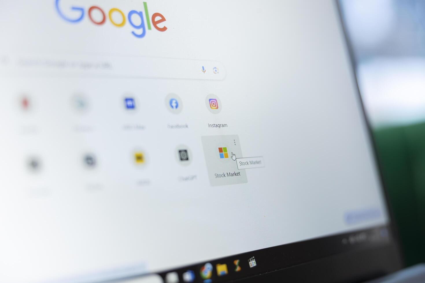 Bucharest, Romania - July 30th 2024 - Stock Market forex web page on Google search, businessman selecting crypto trading bookmark website to check the trends and investment fund. photo