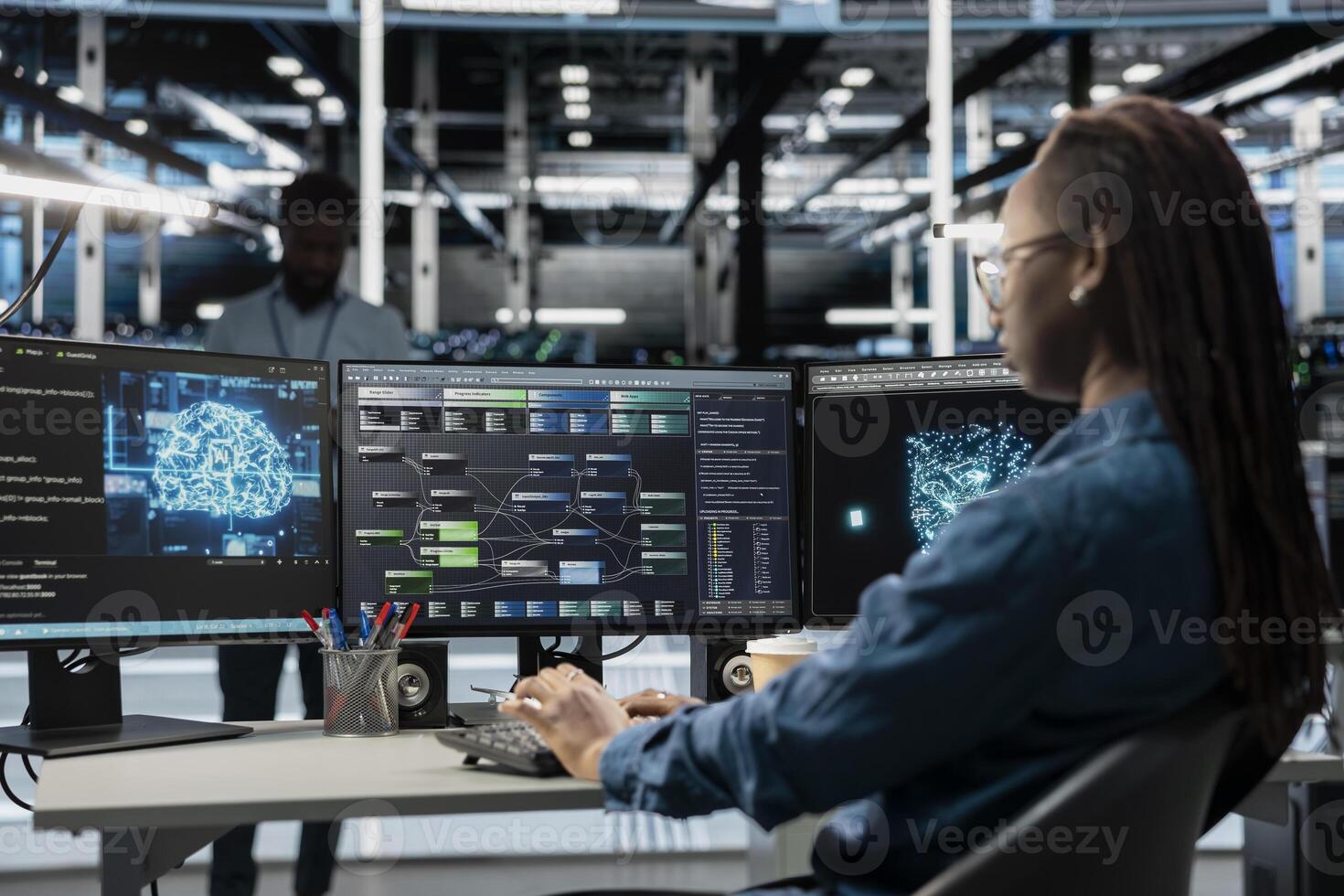 Admin in data center using artificial intelligence computing simulating human brain thought processes in computerized model. Server room employee working with AI machine learning algorithms photo