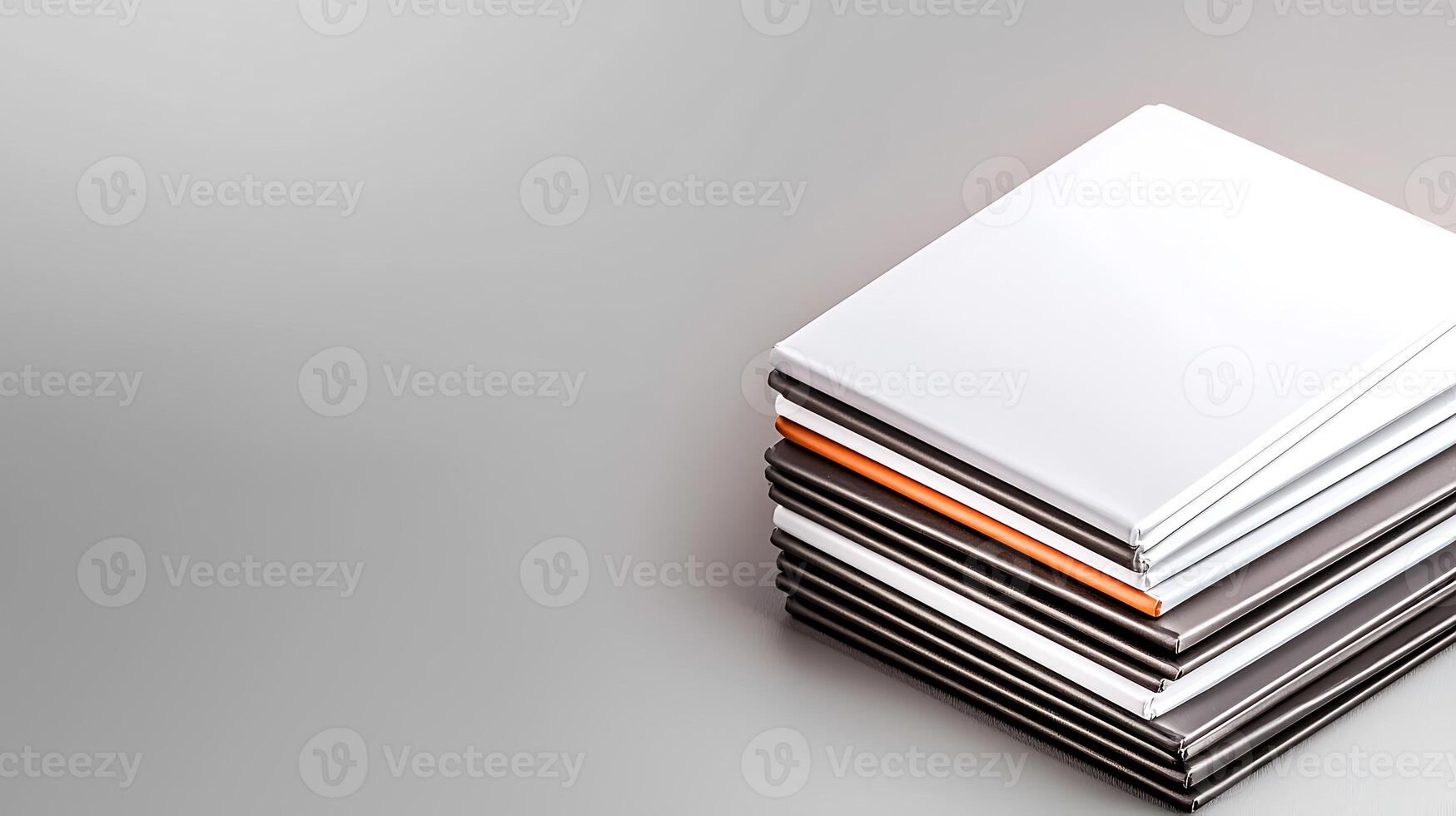 A stack of glossy tiles in various colors arranged neatly on a smooth surface photo