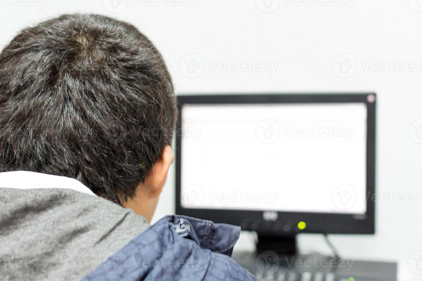 Using a computer desktop by looking to monitor photo