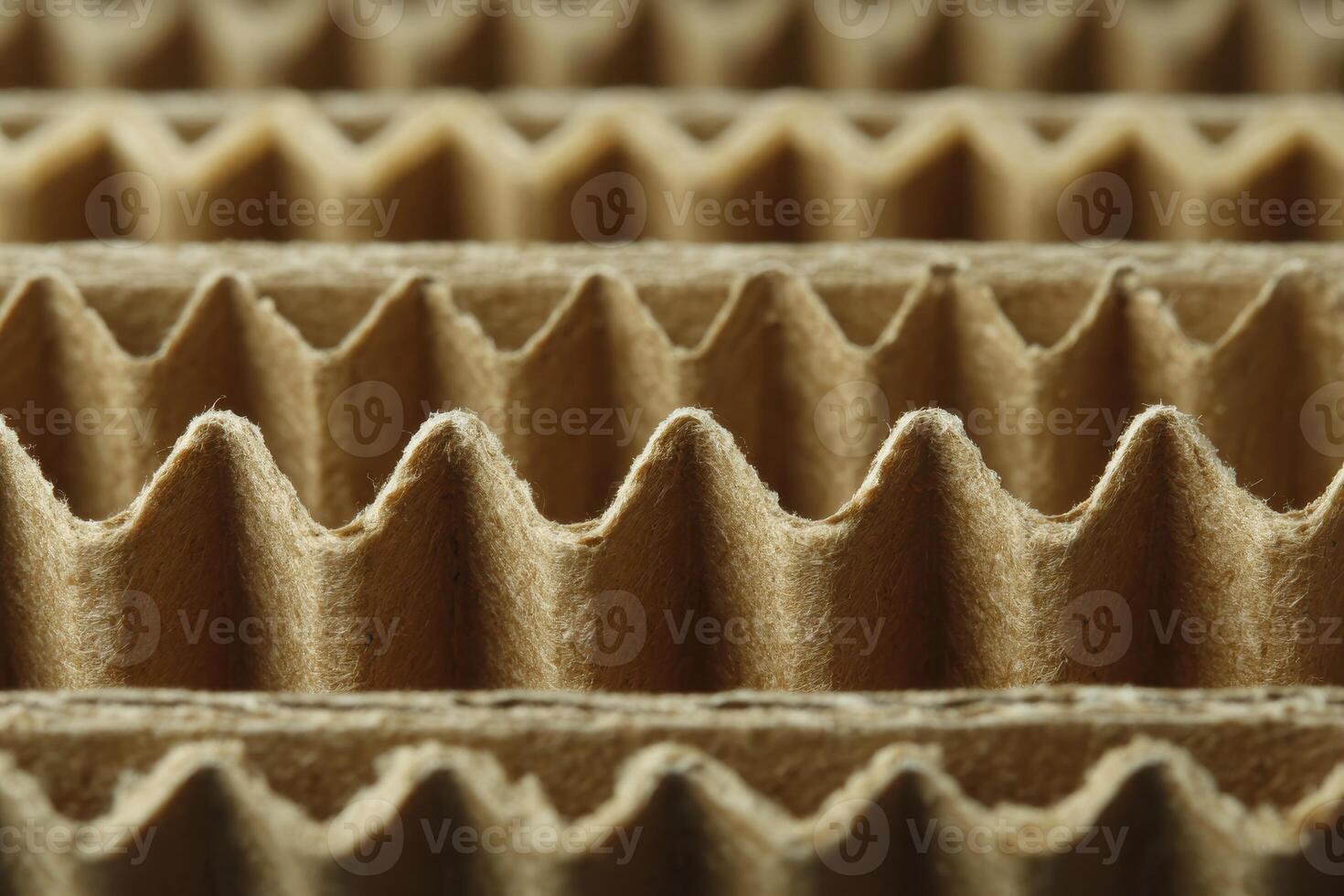 A close up view of corrugated cardboard showing the repeating pattern of ridges and valleys in detail photo