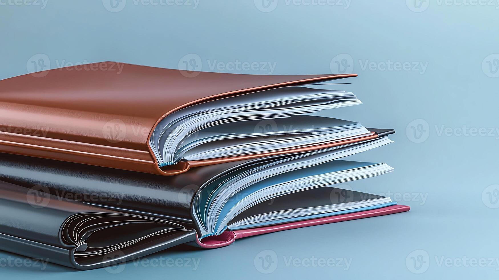 Stacked colorful folders on a smooth surface with a soft blue background, ideal for office use photo