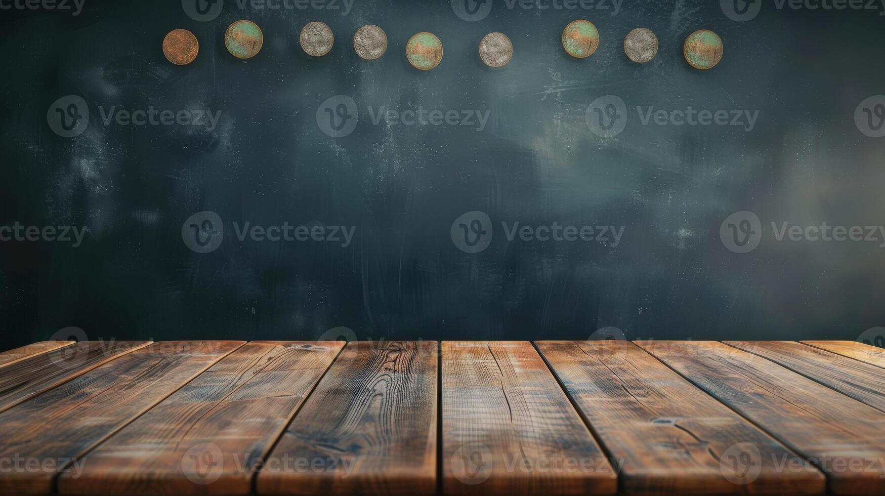 A wooden table with a black background and a row of wooden balls on it. The balls are of different sizes and colors, and they are arranged in a row photo