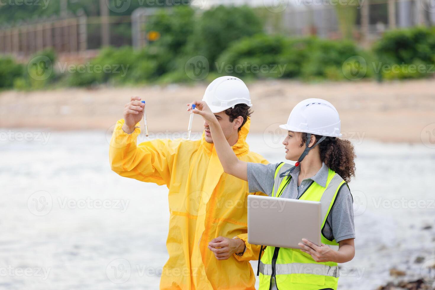 Scientists at Work in the Field, Environmental Scientists Collecting Water Samples for Analysis, Researchers Testing Water Quality at a Lake or Coastal Area photo