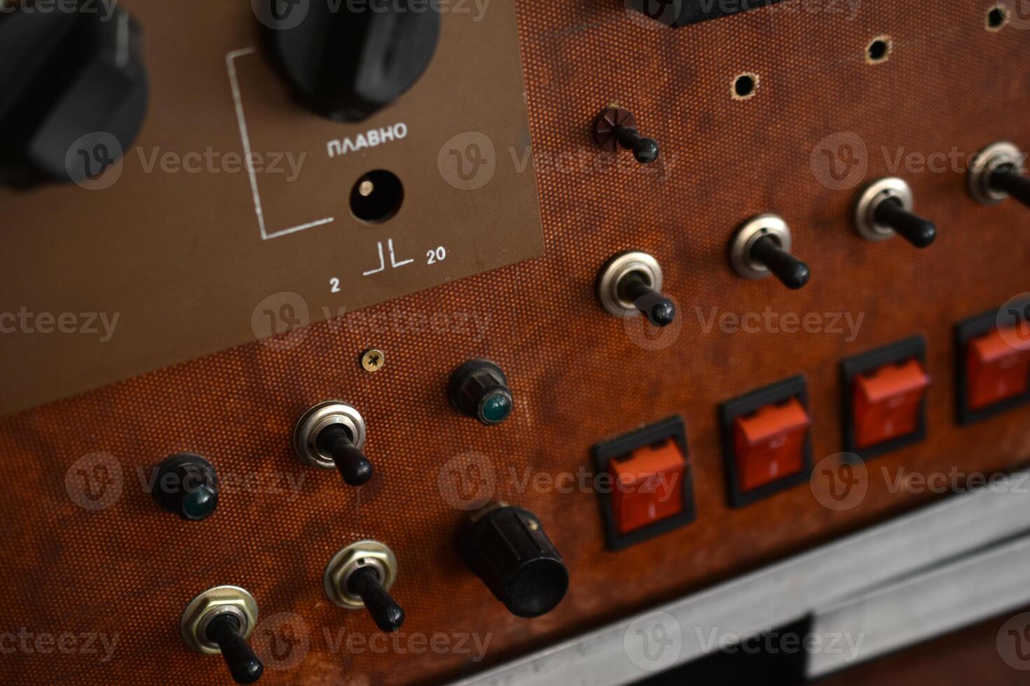 Electrical relay module with coil and contacts. Used in classic signal switching and control operations. photo