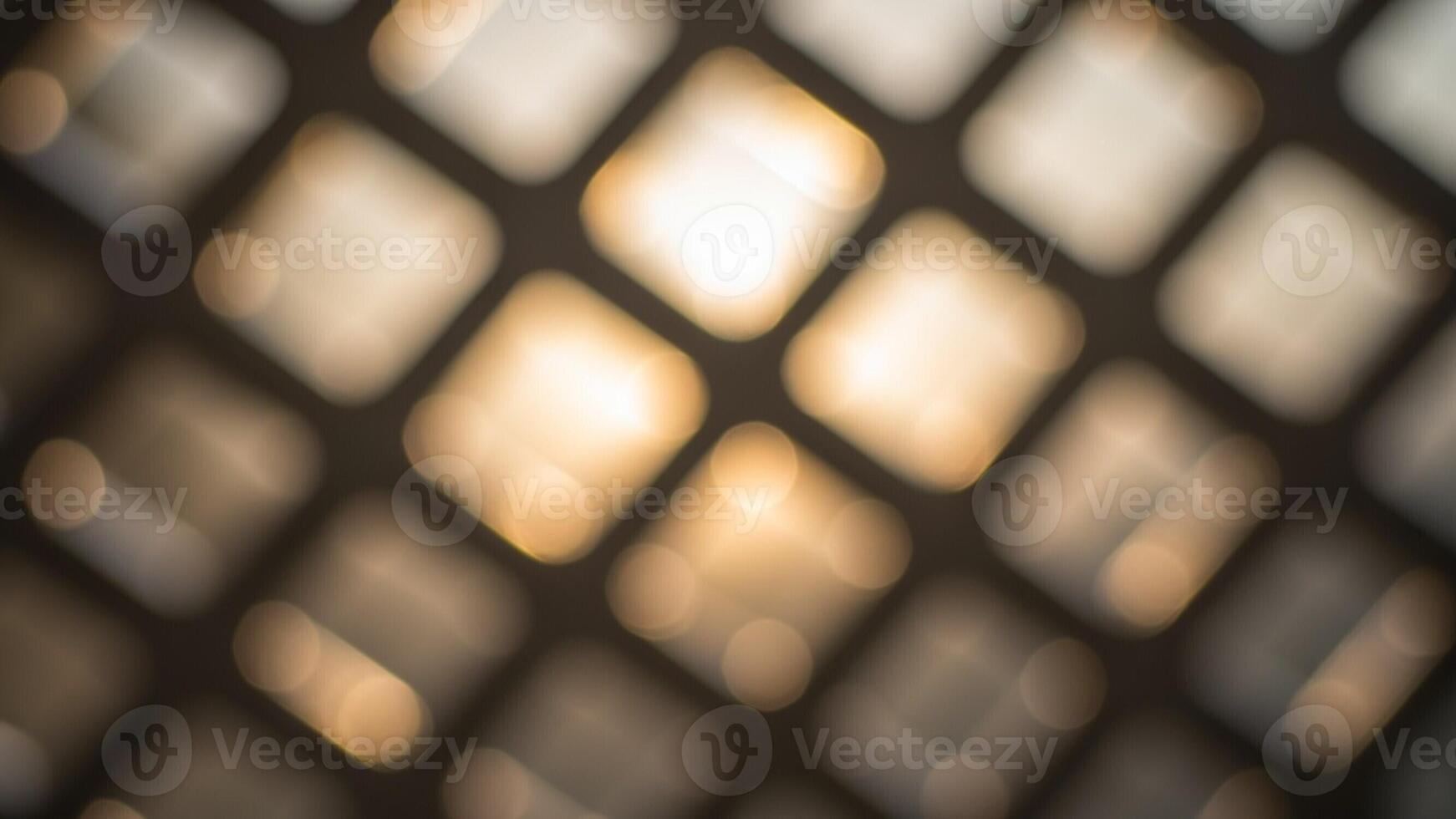 Abstract background of a lattice window with light shining through photo