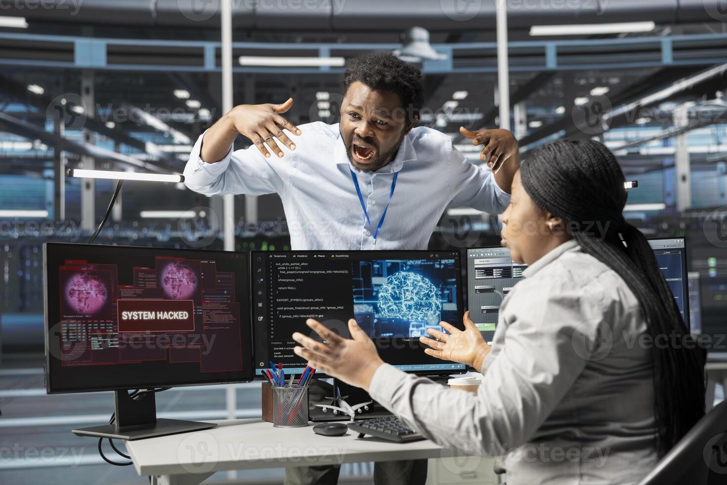 Data center engineers terrified by malicious attack on artificial intelligence computerized systems. Afraid AI server room colleagues frightened by hacking passing firewall security photo