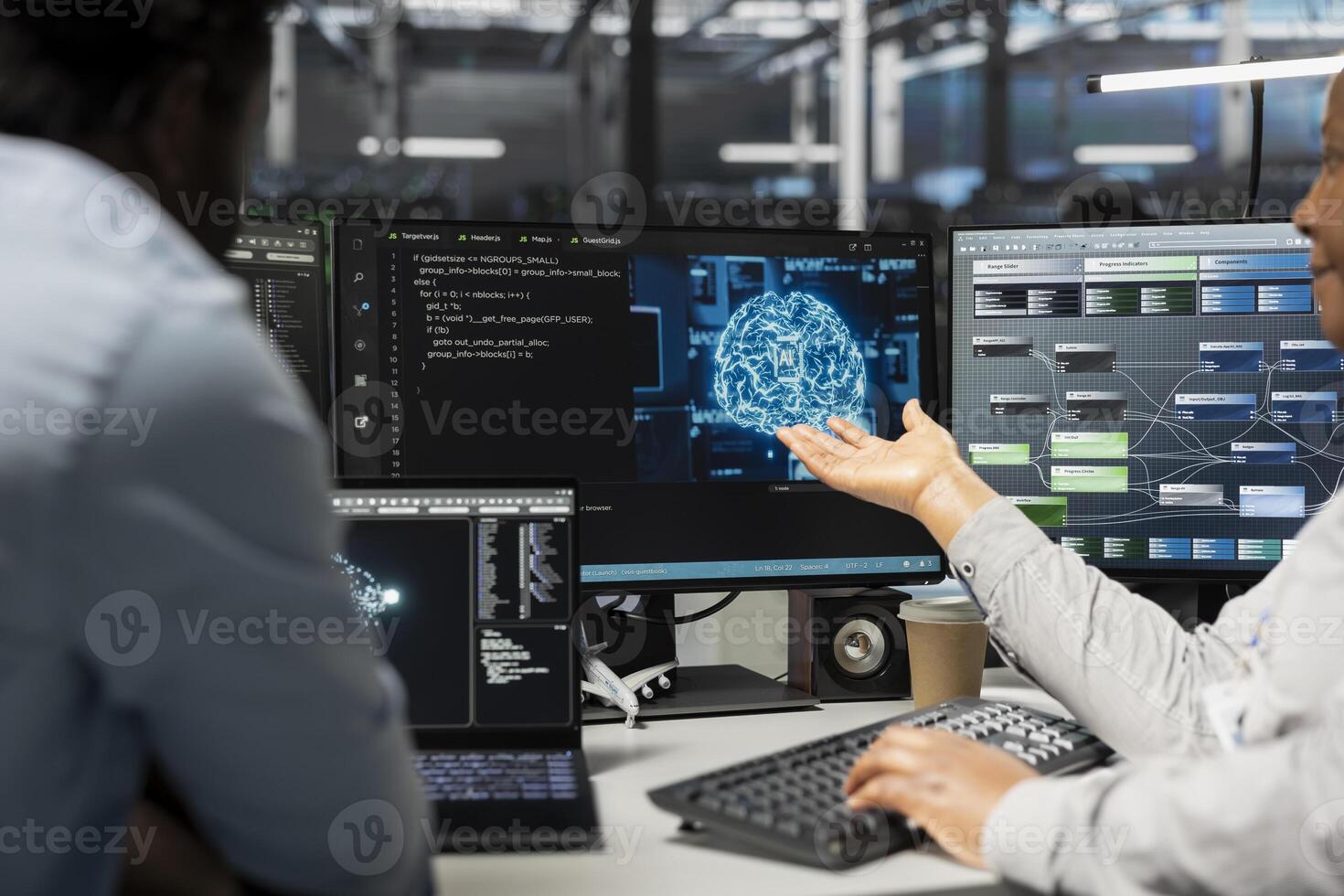 Engineering team inspecting neural network data center used for machine learning. Teamworking colleagues doing maintenance on server hub to optimize it for artificial intelligence workloads photo