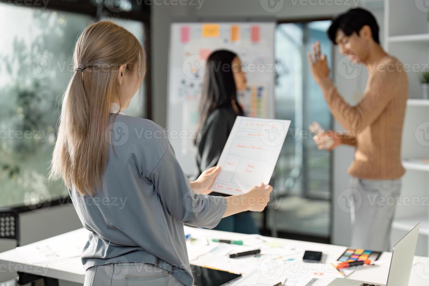 Collaborative UX UI design session with brainstorming and prototyping. photo