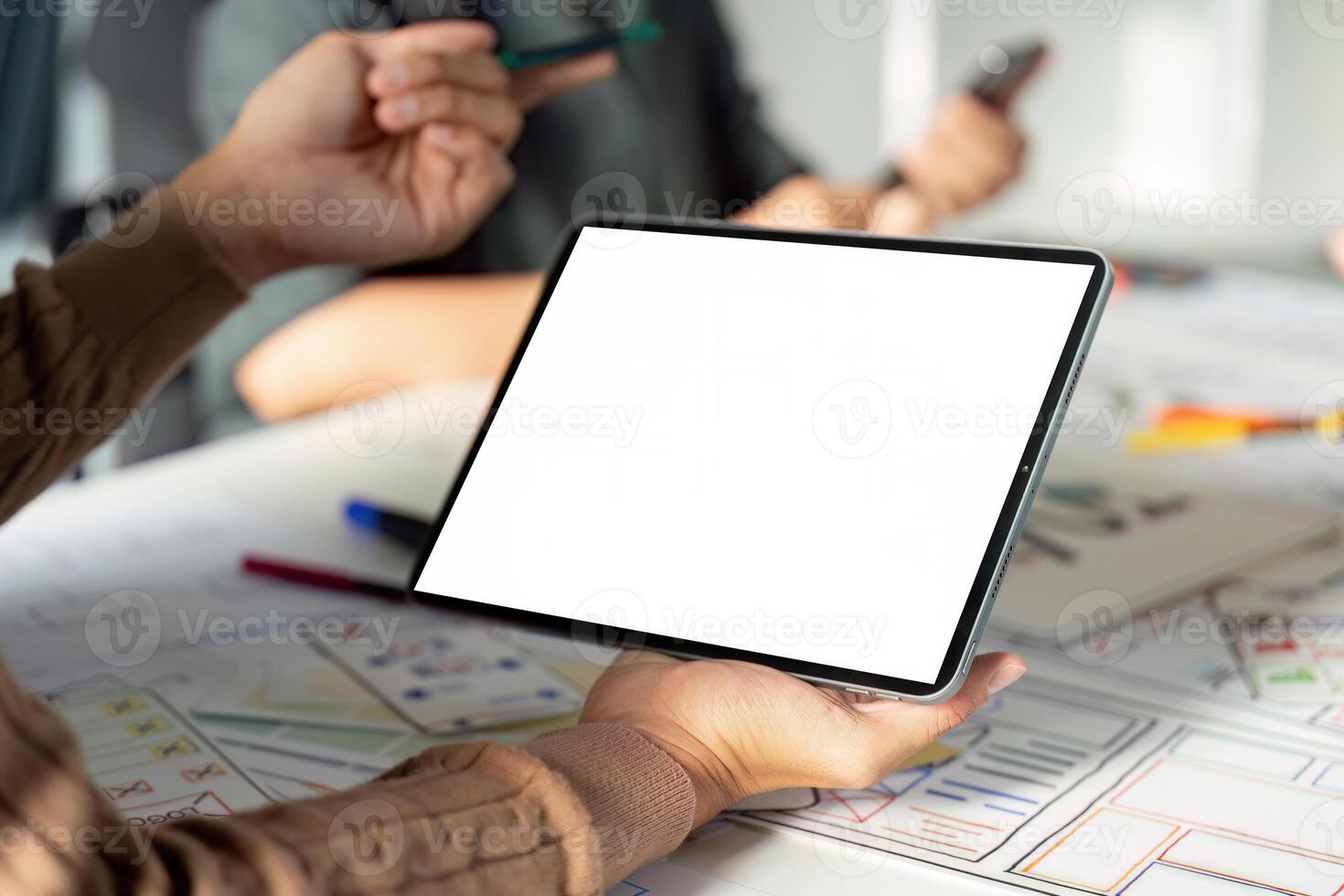 Modern UX UI Design Process with Digital Tablet and Creative Team Collaboration in Office Environment photo