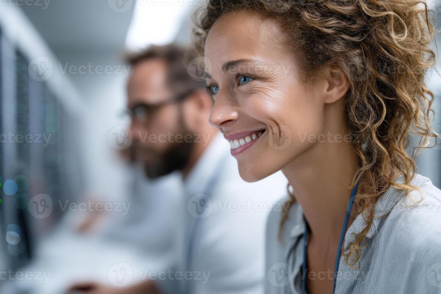Diverse database administrator team monitors servers in bright tech office with space for captions photo