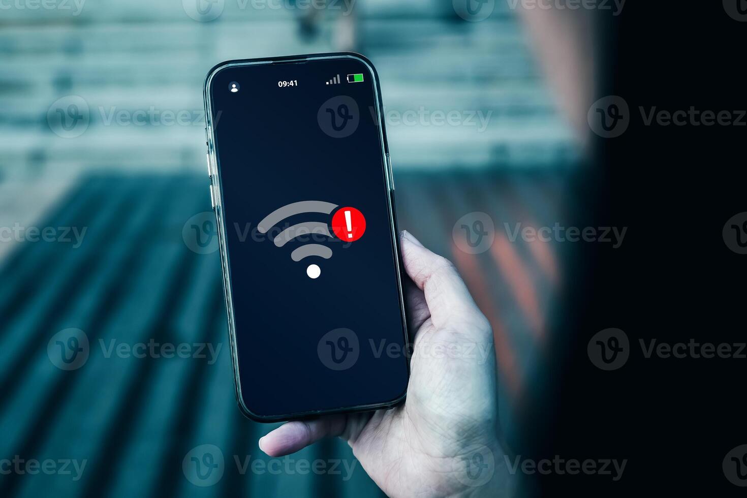 Smartphone screen displays notification of connection problems or no Wi-Fi signal. Concepts of technological, wireless network connections, security cyber, and encryption. photo