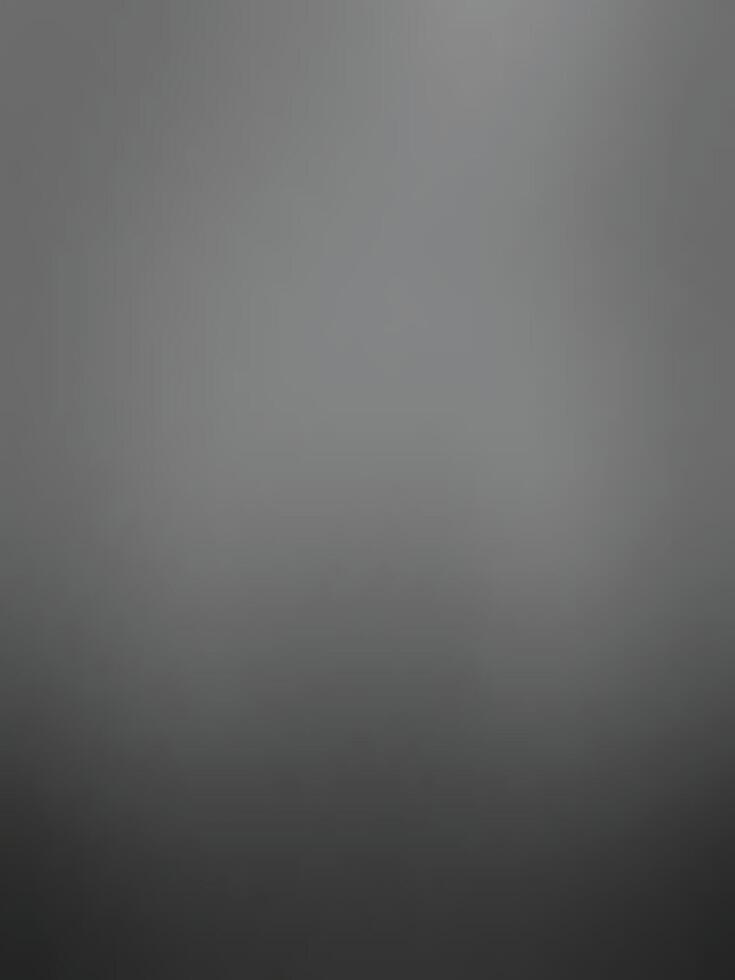 A soft, blurred image featuring shades of gray, creating a minimalist and abstract atmosphere.Classic black gradient background vector