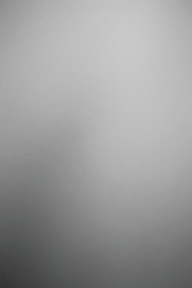 A soft, blurred image featuring shades of gray, creating a minimalist and abstract atmosphere. vector