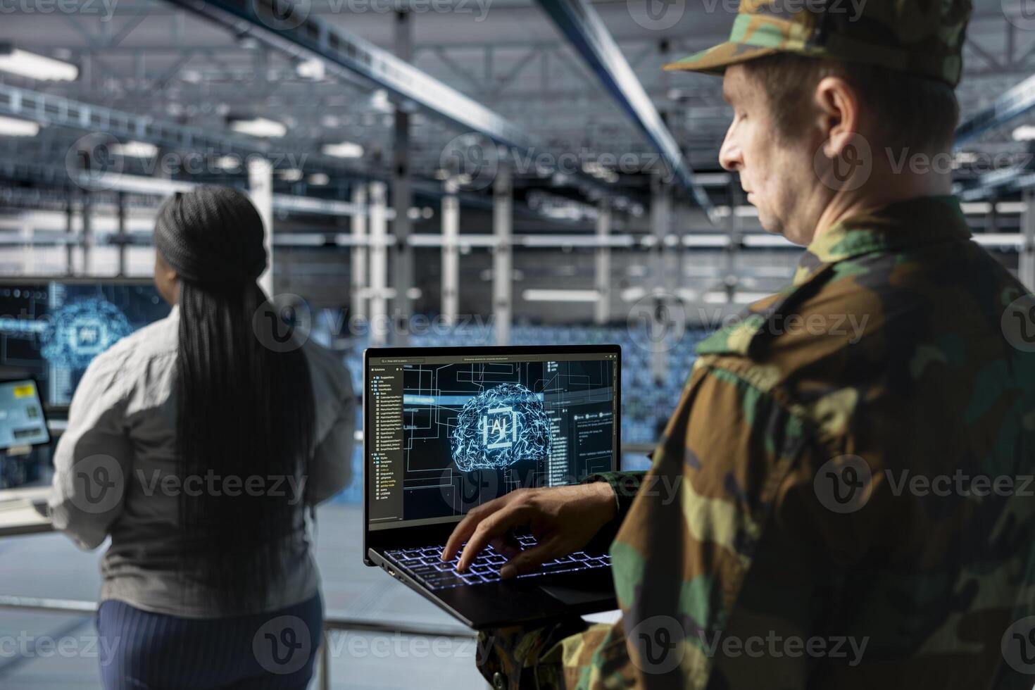 Close up of army tech expert in data center conducting threat simulations using AI networks. Server farm worker using artificial intelligence supporting digital operations photo