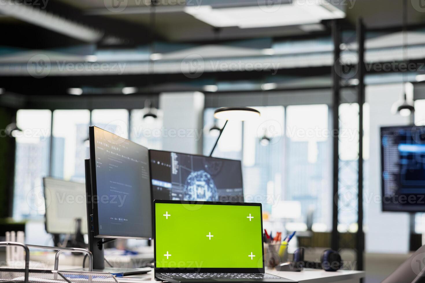 Green screen laptop on AI startup office desk displaying artificial intelligence programming languages code. Chroma key notebook used for AI machine learning testing and quality assurance photo