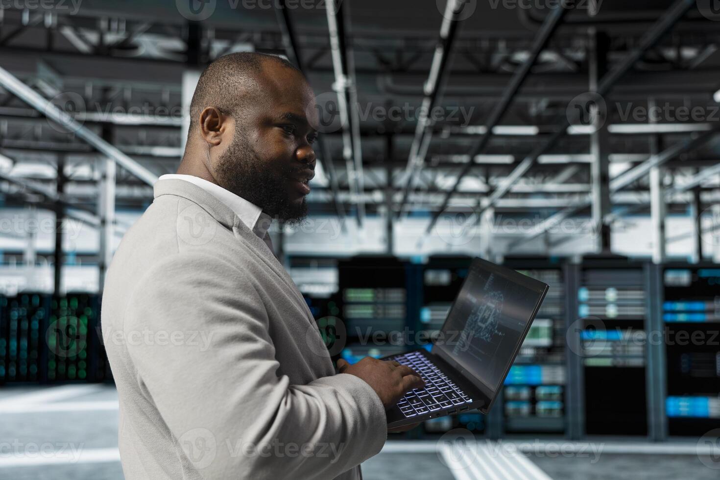 Engineer working in data center providing computing resources and storage to enable AI training and inference. IT expert using machine learning tech to optimize operations and efficiency photo
