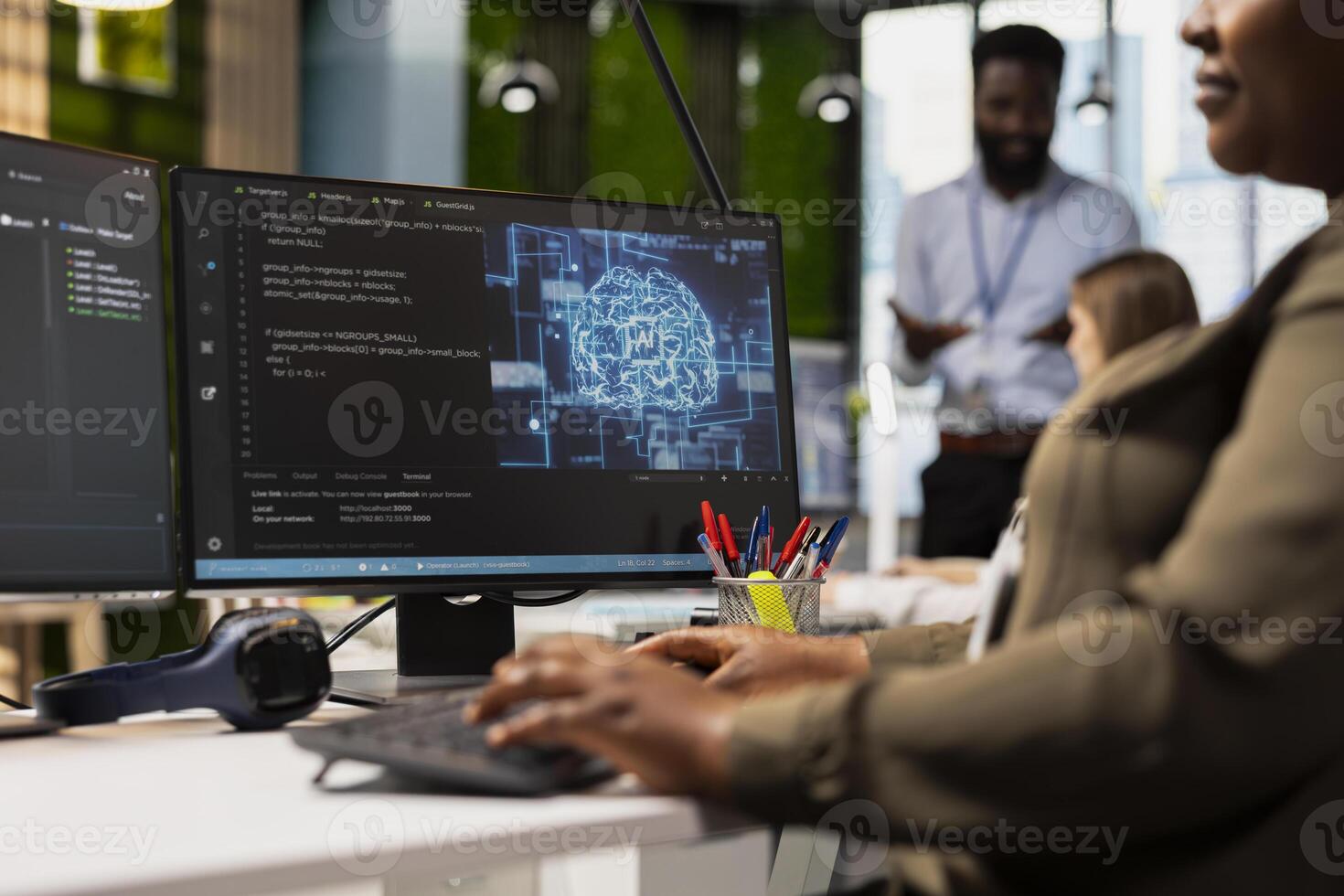 Close up of computer scientist speeding up tasks by following AI language model suggestions in office. IT expert relying on artificial intelligence LLM assistant technology to fix errors photo