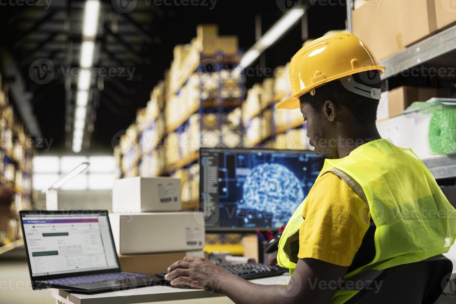 Black employee works with AI tools to enhance package tracking efficiency, using machine learning and parcel tracking info to ensure seamless distribution operations in warehouse. photo
