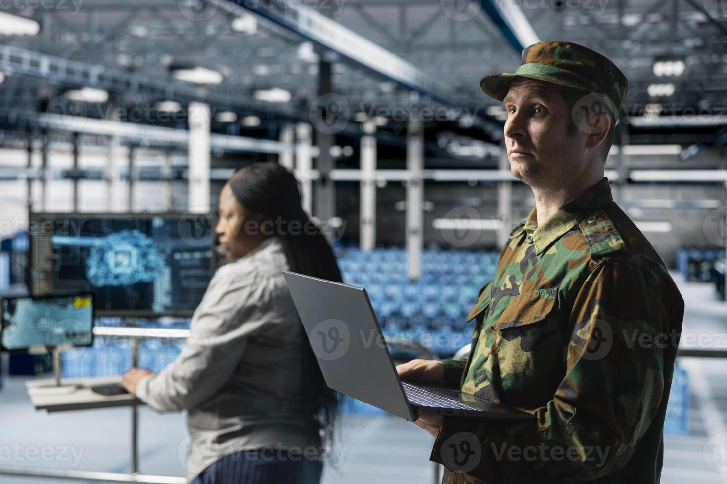 Data center army specialists configuring rigs to support AI integration in military infrastructure. Military server room colleagues enabling autonomous defense operations using AI photo