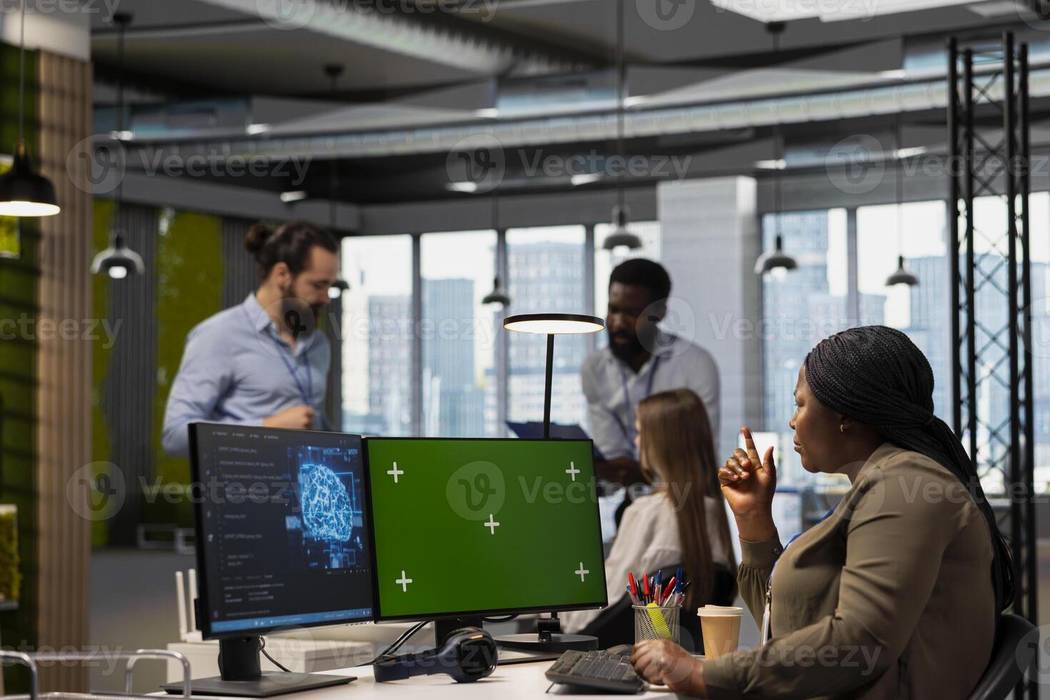 Programmer in tech startup uses AI on chroma key PC to optimize performance and forecast issues. Woman writing code in office, training machine learning models using isolated screen computer photo