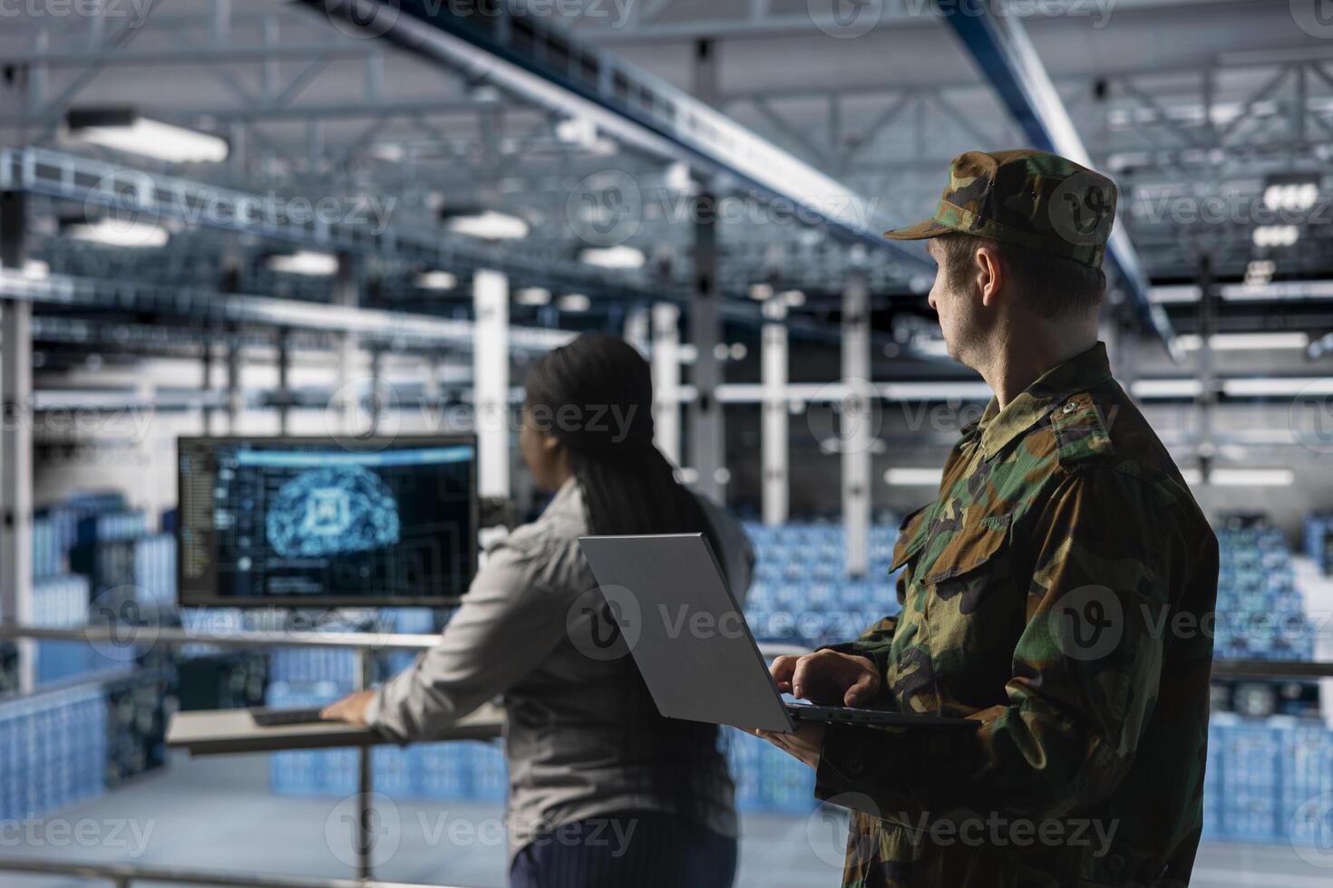 Army specialists implementing artificial intelligence to strengthen military network infrastructure. Military server room colleagues modernizing armed forces by incorporating machine learning photo