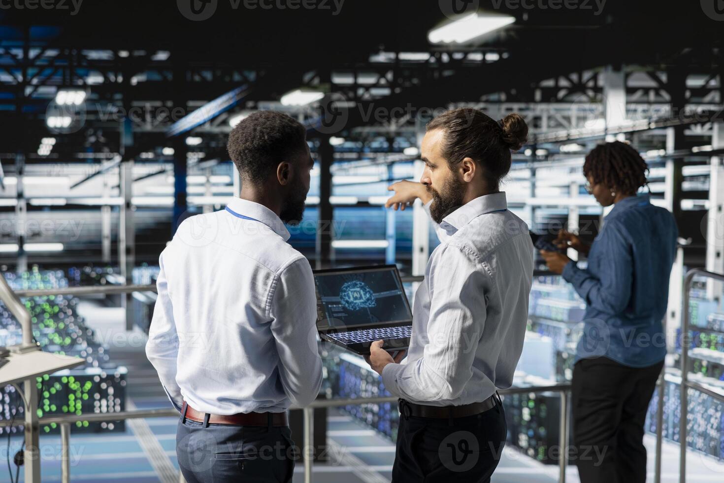 Software developers monitoring neural network on industrial platform, using devices for LLM visualization. Server hub engineering team overseeing machine learning processing on database. photo
