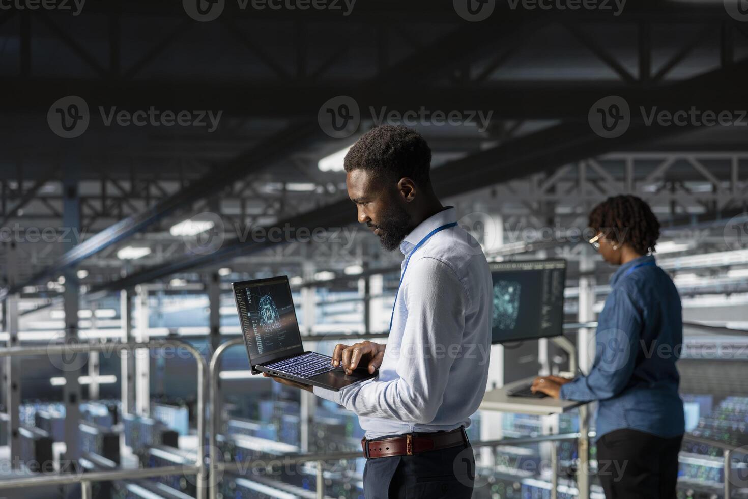 IT experts on data center industrial platform pleased by neural network outputs after completing AI software updates. System administrators team finetuning server rig configurations. photo