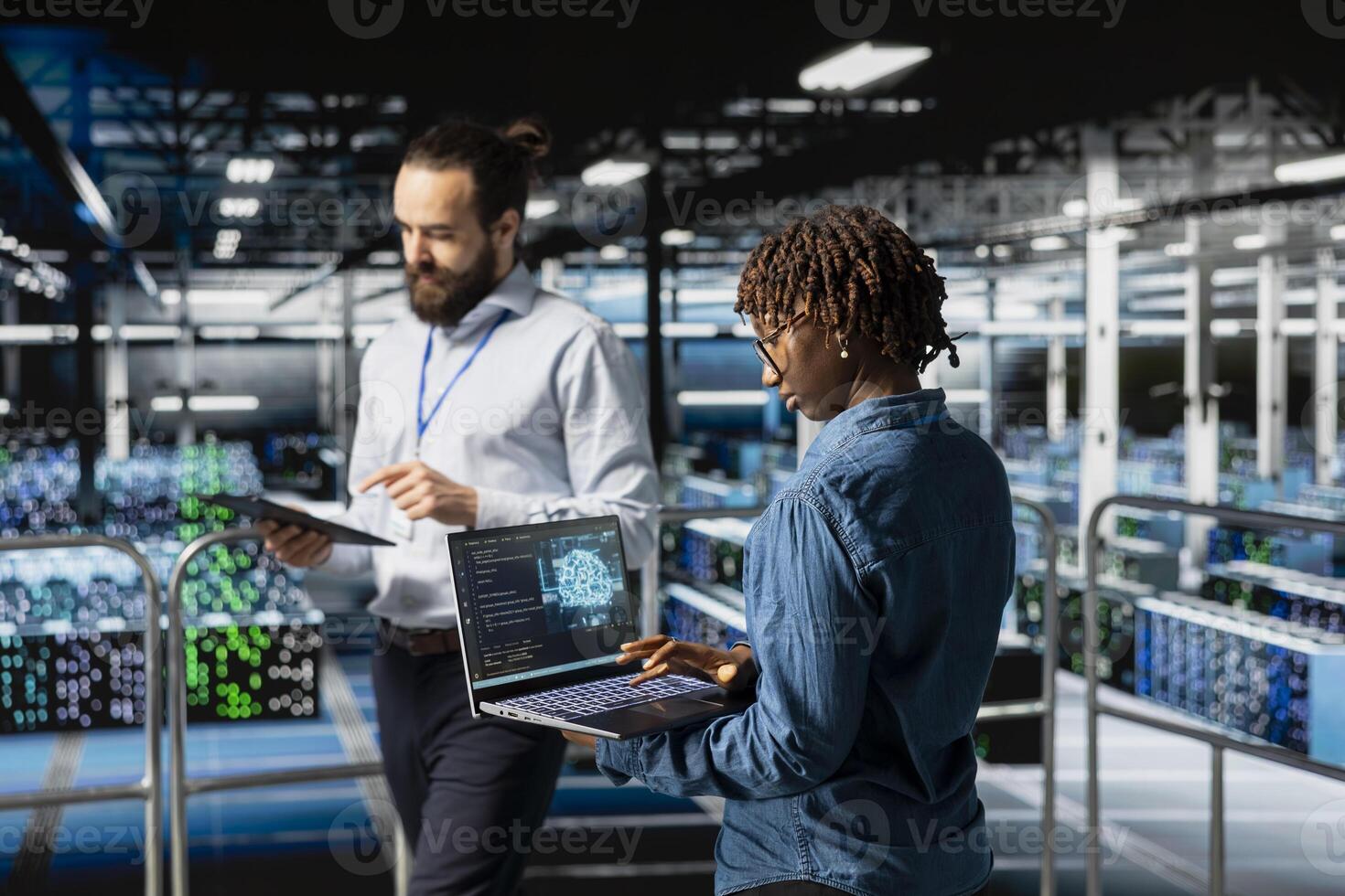 Black woman engineer overseeing code debugging tech on laptop, programming AI deep learning script for datasets automation and innovation in server hub. Industrial platform engineering. photo