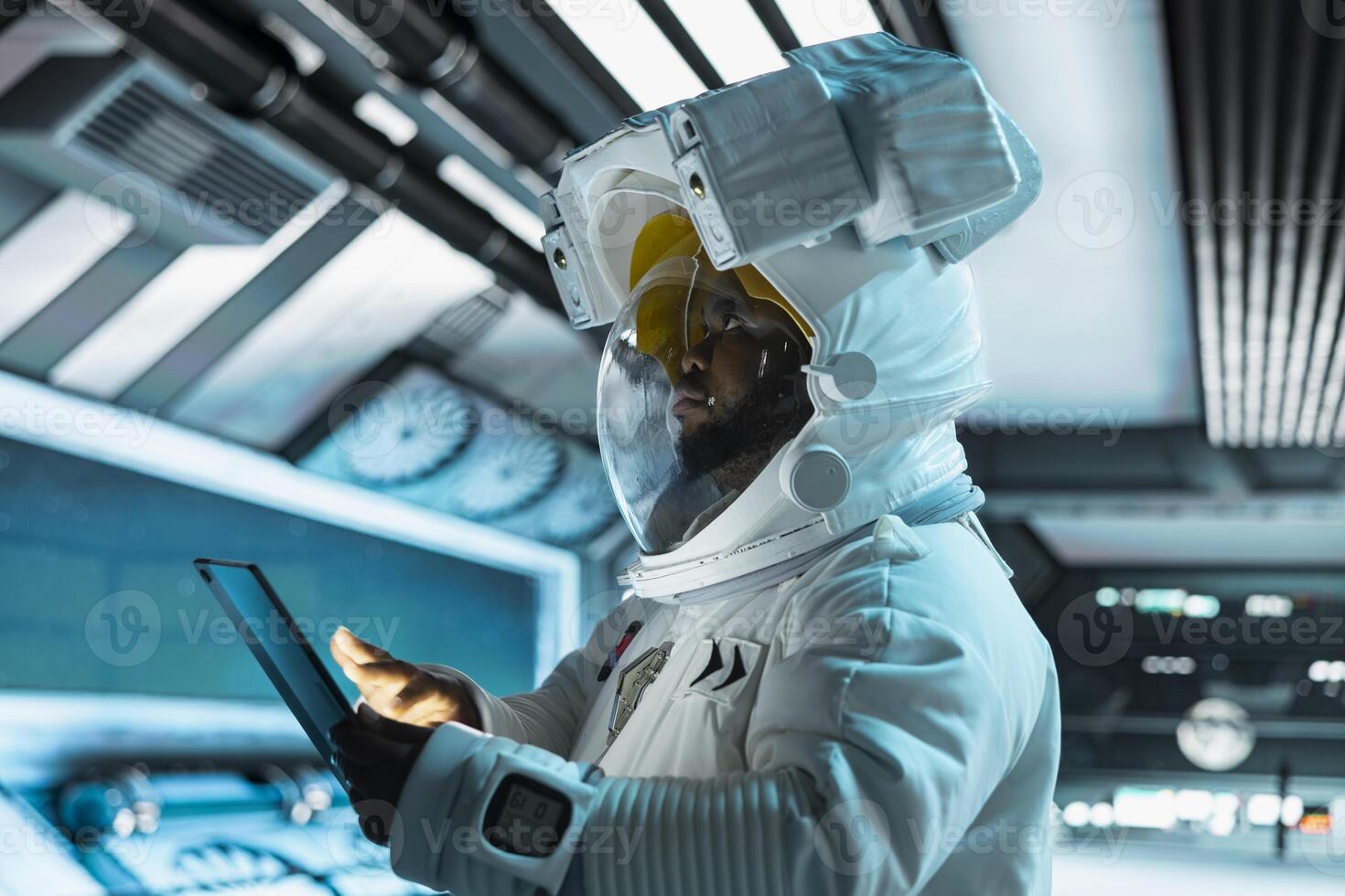 Astronaut wearing helmet doing galaxy observation using tablet during scientific mission in spacecraft. Spaceship cosmonaut in spacesuit monitoring system diagnostics during planetary exploration photo