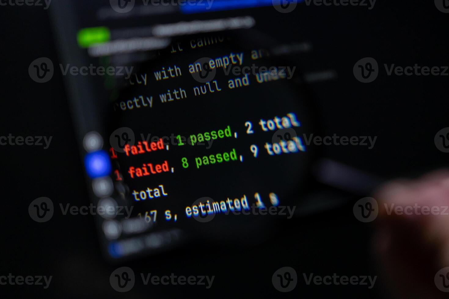 Dark computer screen displays programming test results showing 'failed' and 'passed' counts, symbolizing software development, debugging, and quality assurance photo