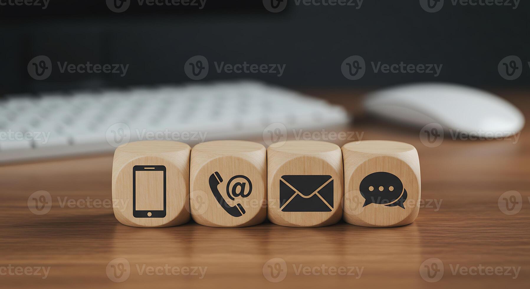Wooden Blocks with Communication Icons in Front of Computer Keyboard and Mouse photo